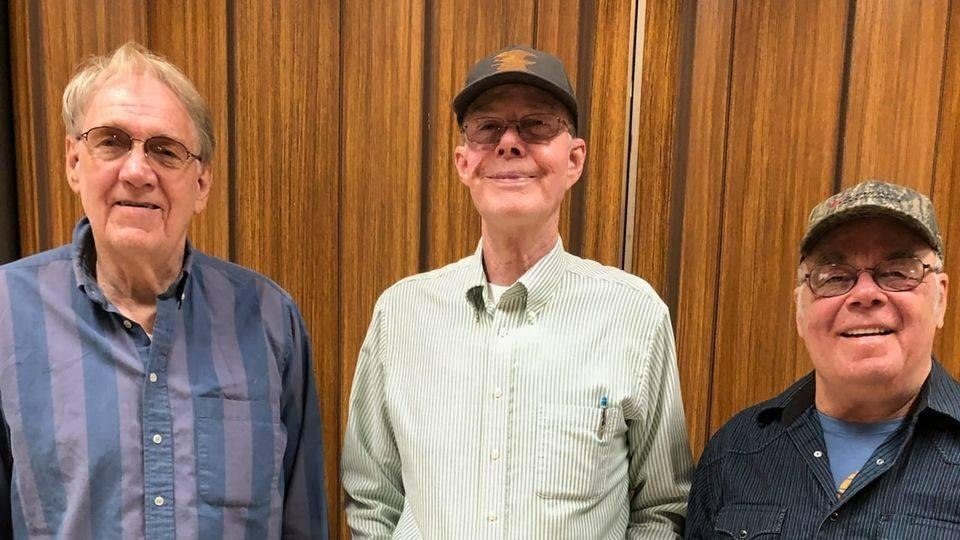 Three men at Firehouse Brewing Co. in Rapid City SD